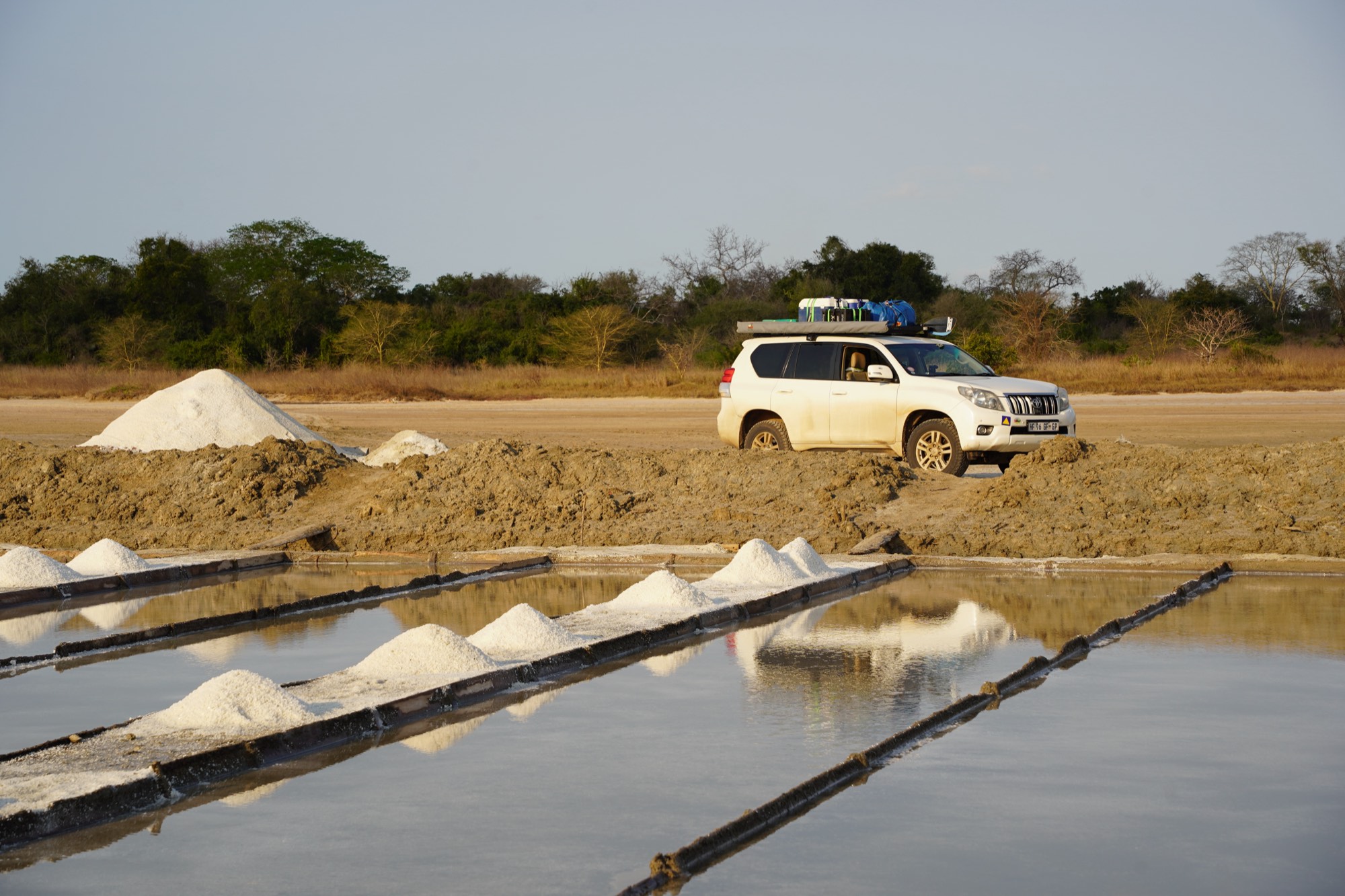 Beach signposts marking dives and excursions on the Mozambique coast